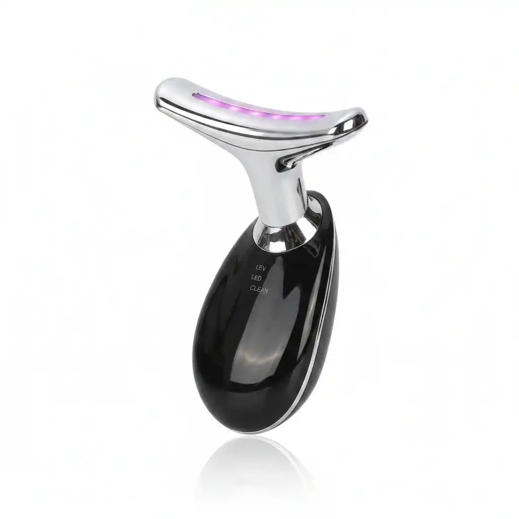 LED facial cleansing device with purple light, sleek black and chrome design for skincare routine