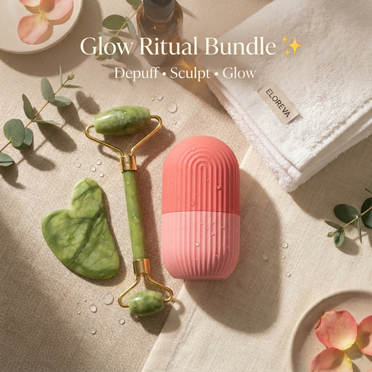 ELOREVA Glow Ritual Bundle featuring a green jade roller, heart-shaped gua sha, and pink silicone ice roller on a luxury beige spa-style flatlay with eucalyptus leaves and morning sunlight.