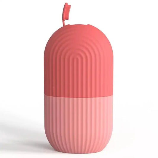 Pink ribbed capsule-shaped beauty storage container with flip-top lid for skincare essentials